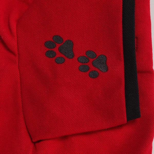red-coloured polo t-shirt for dogs with paws printed on sleeves