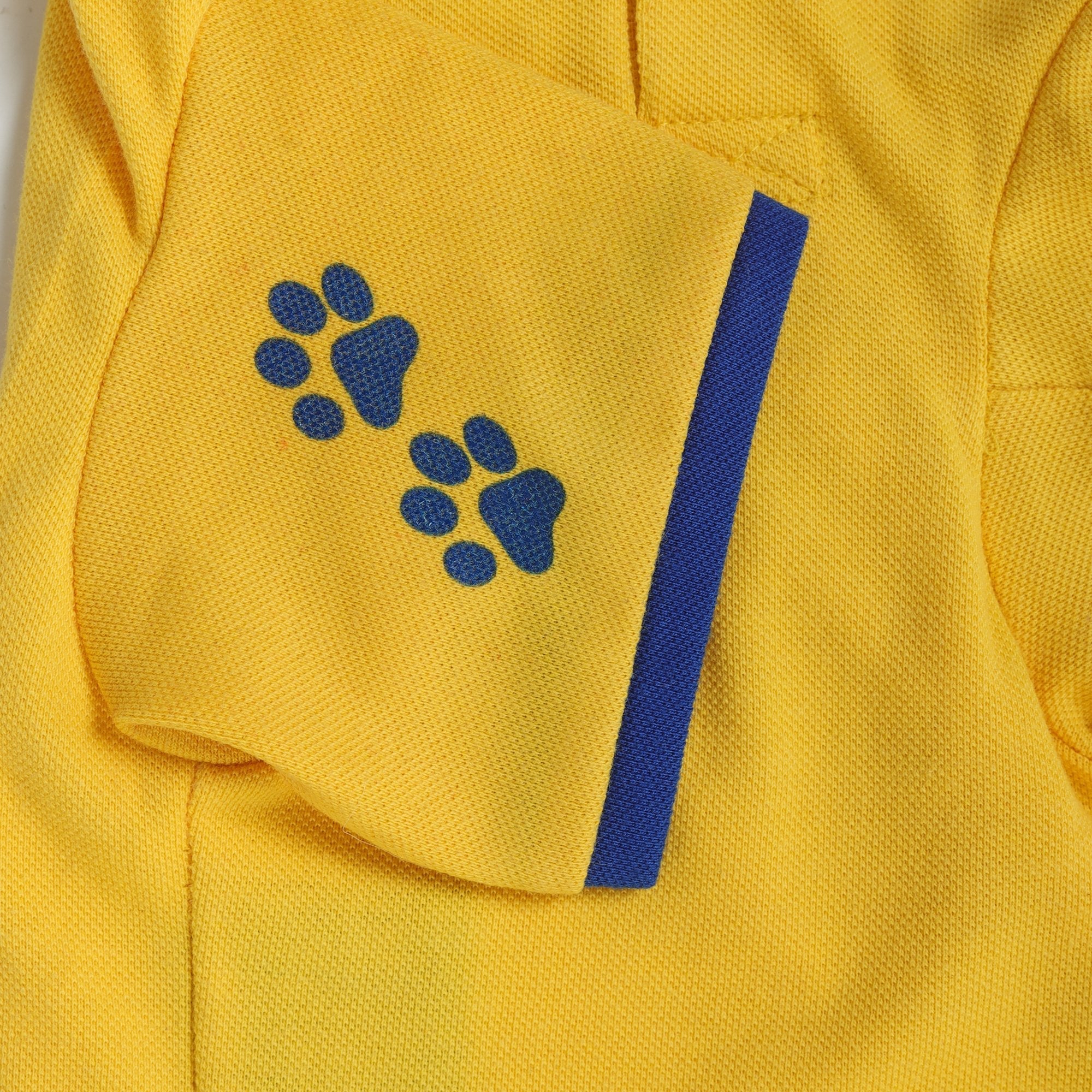 yellow-coloured polo t-shirt for dogs with paws printed on sleeves